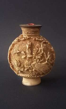 Antique Chinese ivory snuff bottle decorated with beautiful  carved relief