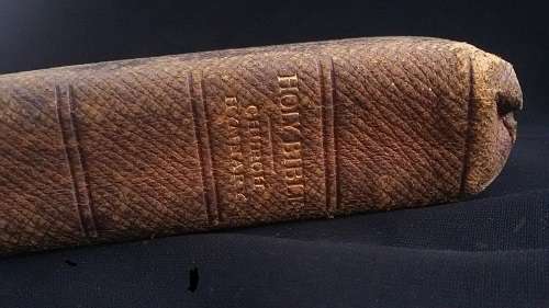 100 year old Bible, leather bound and sewn with silk (dated 1917) with gilt edged pages