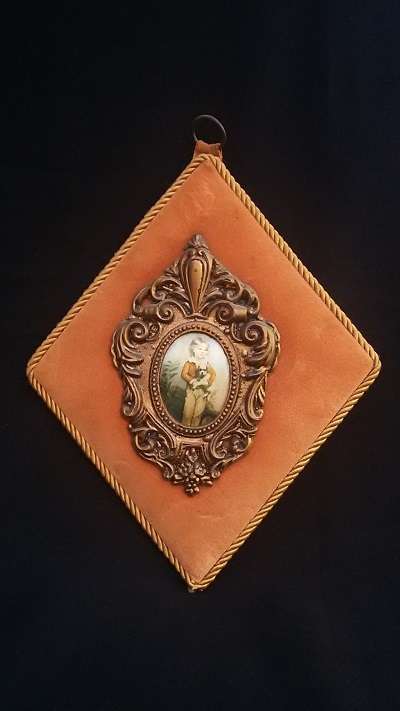 Silk printed picture in ornate gilt frame on velvet backing (numbered)