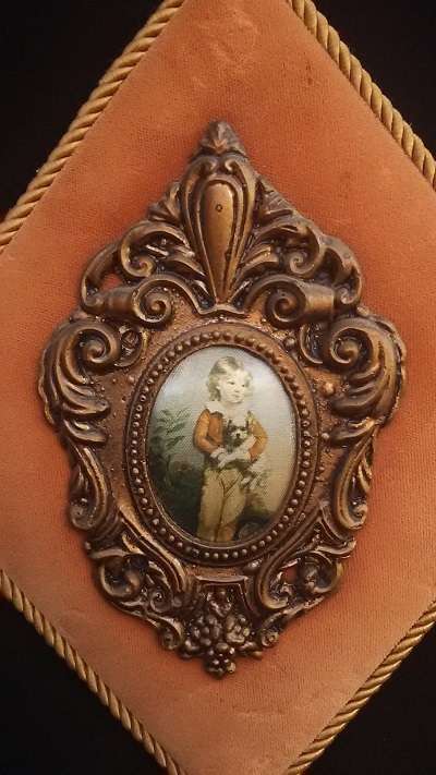 Silk printed picture in ornate gilt frame on velvet backing (numbered)