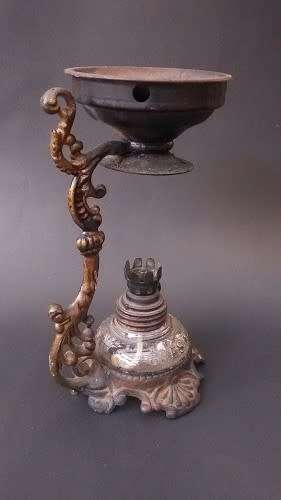 Small cast iron oil burner with glass bottle - no cracks