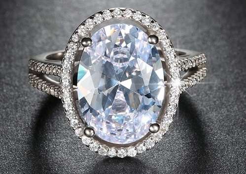 Magnificent 6 CARAT Oval cut Split Shank Simulated Diamond Halo Ring. Size 6