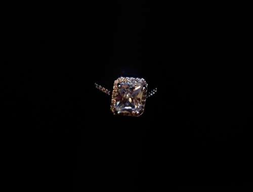 Incredible 3.79 Carat (TW) Radiant Cut Halo Ring. Size 8.