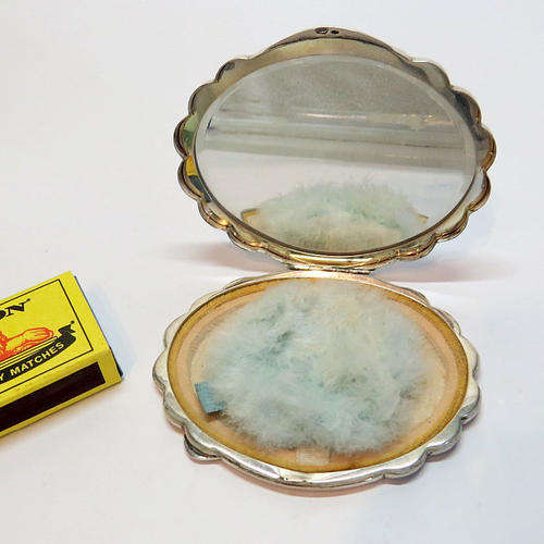 Powder compact embossed and engraved silver