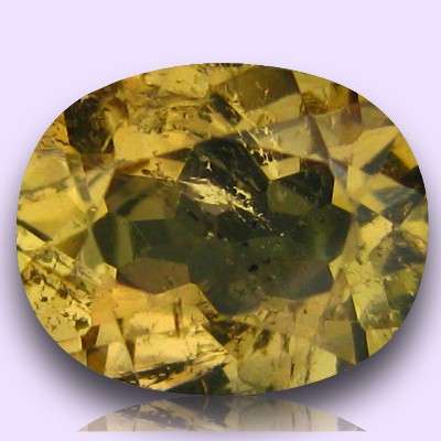 100% Natural COLOUR CHANGE AXINITE oval facet (Afghanistan) - Moderately rare!