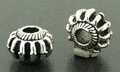 7mm x 4mm nickel SQUASHED BALL spacer (sold individually)