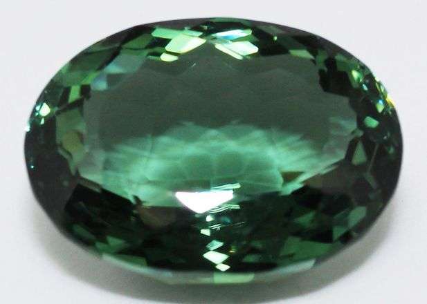 31.99 cts PRASIOLITE / GREEN AMETHYST oval facet (Uruguay)