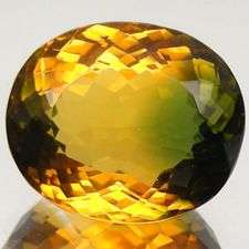 Impressive gem! 32.83 cts Natural BI-COLOUR QUARTZ oval facet (Africa)