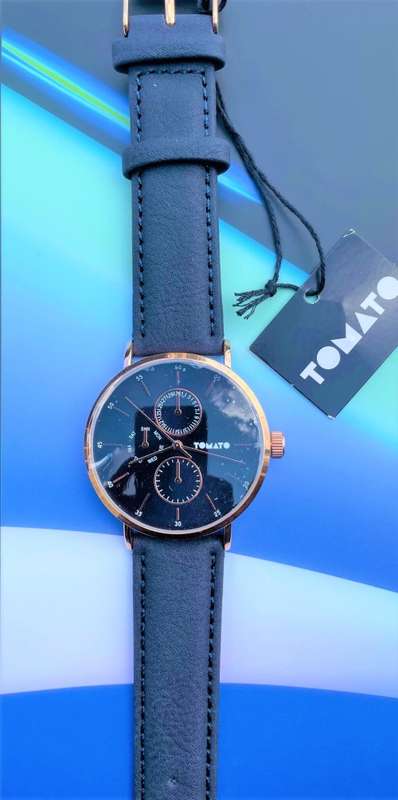 Tomato T743170 Timepiece With Rose Gold Dial Stones Round Case finished With A Beige Vegan leather