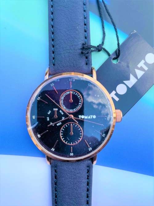 Tomato T743170 Timepiece With Rose Gold Dial Stones Round Case finished With A Beige Vegan leather