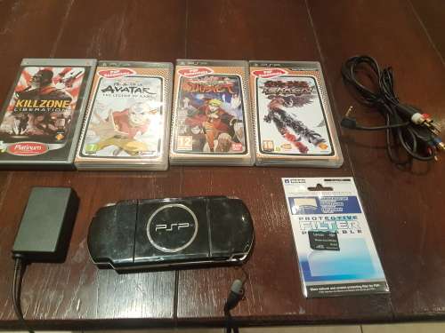 PSP SLIM CONSOLE WITH WIFI 4GB MCARD WITH FEW GAMES AND CABLES