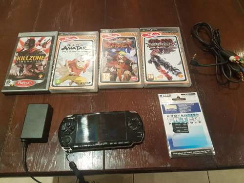 PSP SLIM CONSOLE WITH WIFI 4GB MCARD WITH FEW GAMES AND CABLES