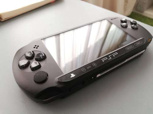 PSP STREET WITH 4GB MEMORY CARD AND CHARGER WITH GAMES- GREAT DEALS!!