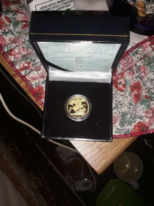 1914 real clad gold soverein coin