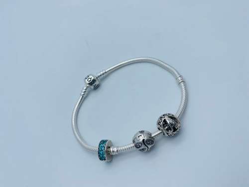 *PANDORA BRACELET W/THREE PANDORA CHARMS* - BLACK FRIDAY BID FROM R1