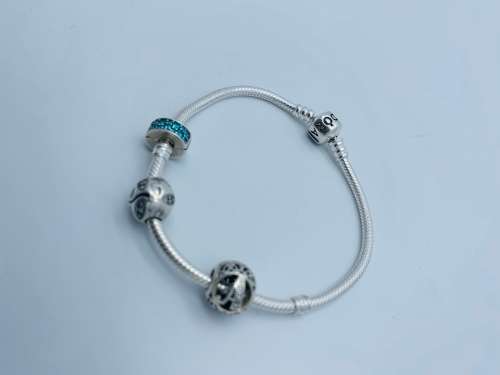 *PANDORA BRACELET W/THREE PANDORA CHARMS* - BLACK FRIDAY BID FROM R1