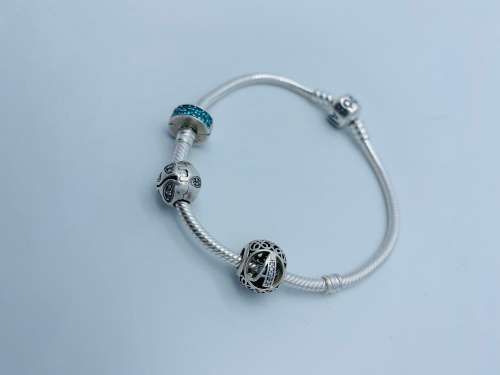*PANDORA BRACELET W/THREE PANDORA CHARMS* - BLACK FRIDAY BID FROM R1