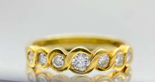 *0.50CT DIAMOND TWIRL ETERNITY RING* 18K GOLD!