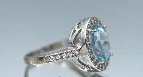 RETAIL:R3500 - NATURAL AQUAMARINE SILVER CZ HALO ETERNITY RING