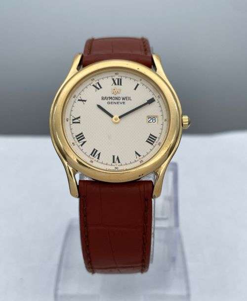 RETAIL:12000- STUNNING RAYMOND WEIL GENEVE COLLECTORS GOLD DRESS WATCH!