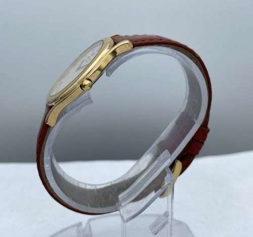 RETAIL:12000- STUNNING RAYMOND WEIL GENEVE COLLECTORS GOLD DRESS WATCH!