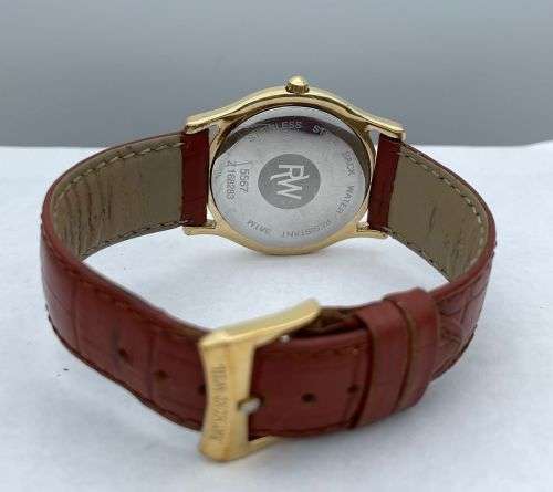 RETAIL:12000- STUNNING RAYMOND WEIL GENEVE COLLECTORS GOLD DRESS WATCH!