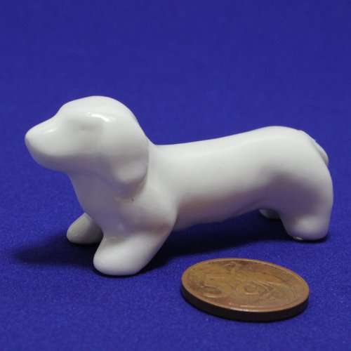 Porcelain sausage dog figure ornament, 2.75CM very fragile