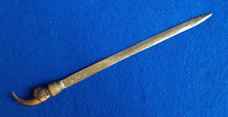 Letter opener with lion claw