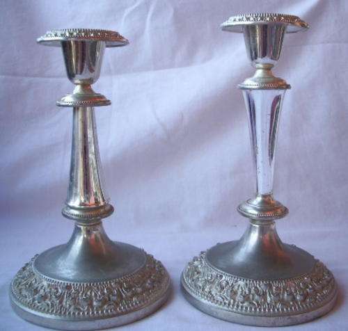 TWO SILVER PLATED CANDLESTICK HOLDERS