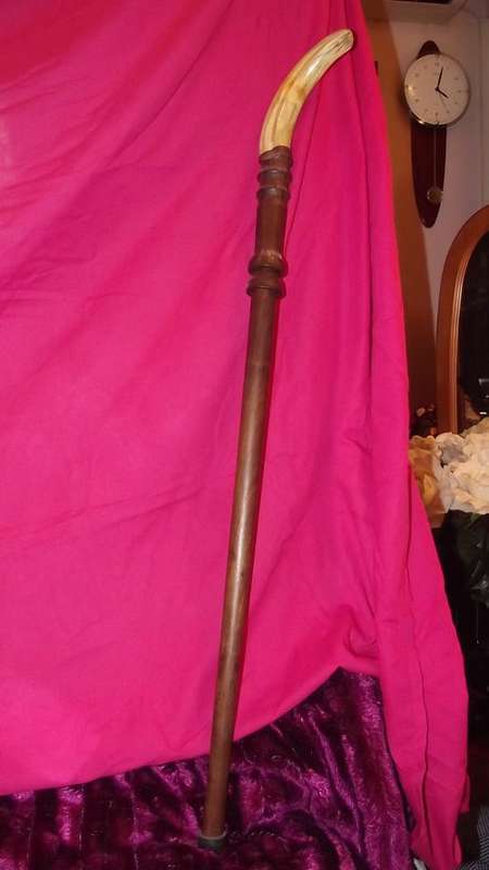 WARTHOG TUSK AND TAMBUTI WOOD, SWORD WALKING STICK WELL CRAFTED AND BEAUTIFULLY SELLING PRICE $ 450