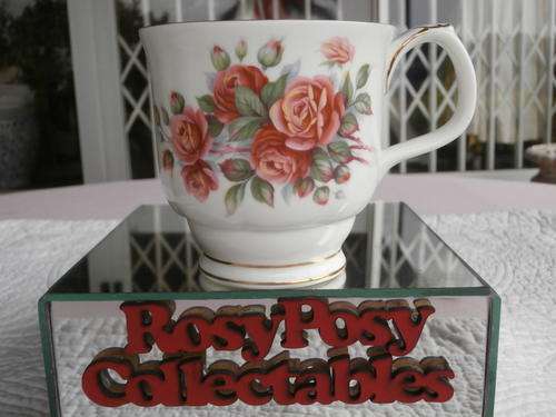 A STUNNING ROYAL ALBERT COFFEE CUP ''CENTENNIAL ROSE'' IN MINT CONDITION NO DAMAGE