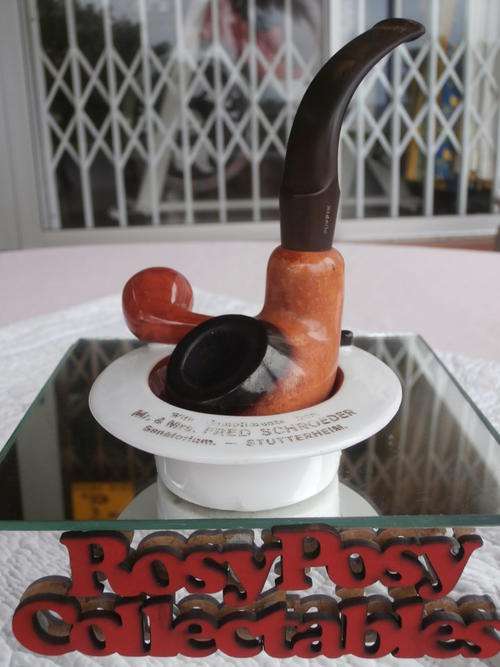 WOW WHAT A FIND A PUFFIN ANTIQUE PIPE ALONG WITH A SMALL PIPE ASHTRAY IN MINT CONDITION.