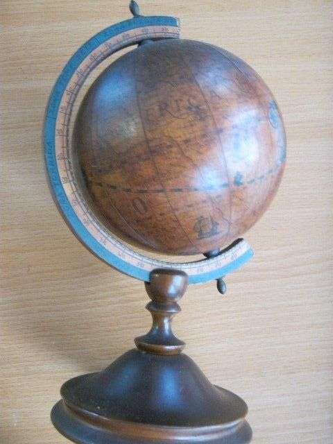Globe on wooden stand