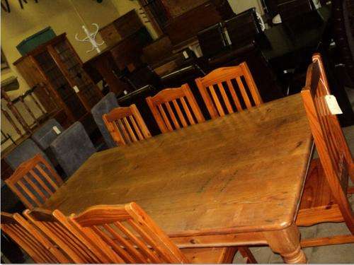 pine table and 8 chairs