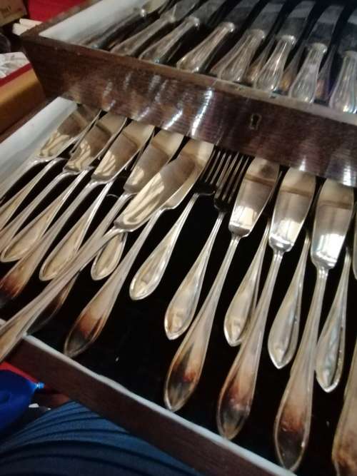 Antique cutlery set in oak box
