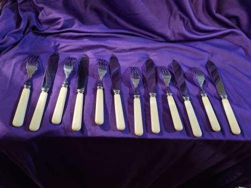 Antique fish knive and fork set bone handel