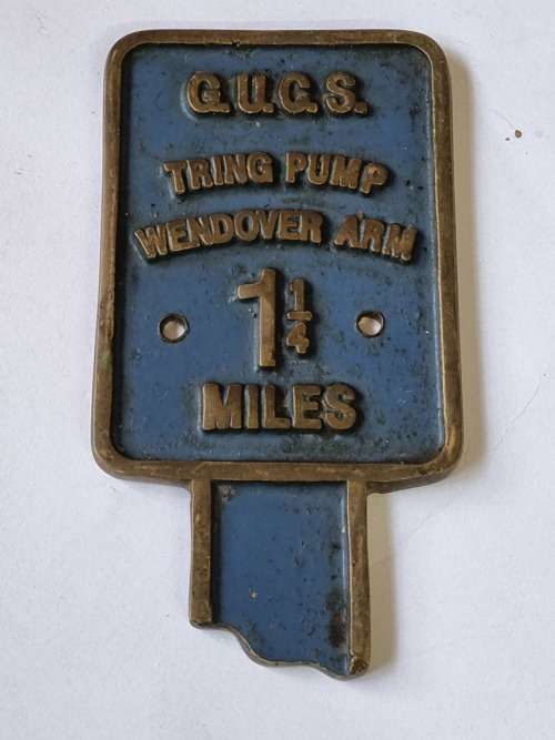 Train brass sign
