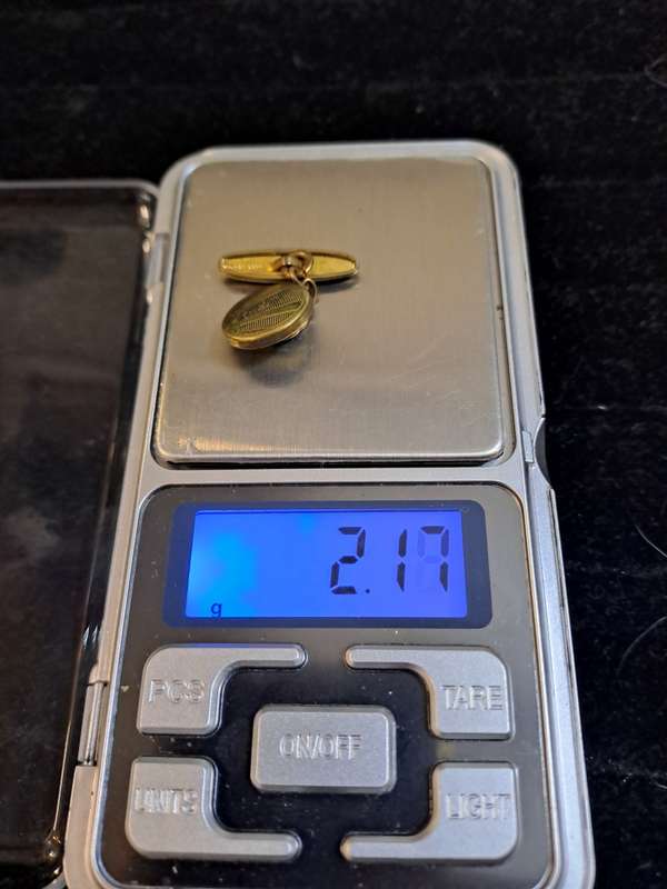 9ct ladies ring with 2 small diamonds and a cubic  and 1 odd cufflink