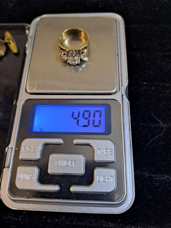 9ct ladies ring with 2 small diamonds and a cubic  and 1 odd cufflink
