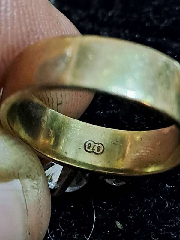 9ct ladies ring with 2 small diamonds and a cubic  and 1 odd cufflink