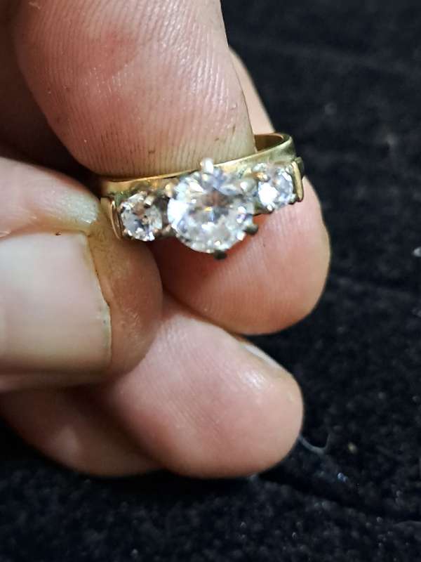 9ct ladies ring with 2 small diamonds and a cubic  and 1 odd cufflink