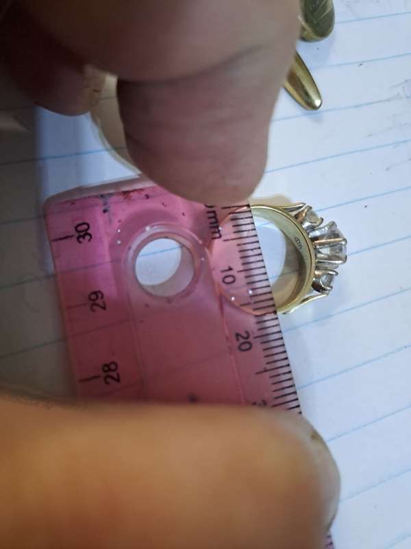 9ct ladies ring with 2 small diamonds and a cubic  and 1 odd cufflink