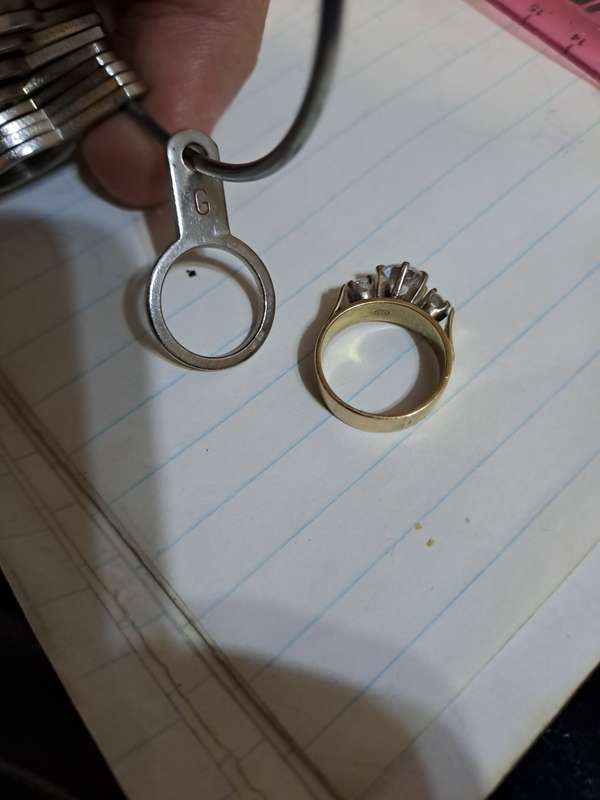 9ct ladies ring with 2 small diamonds and a cubic  and 1 odd cufflink