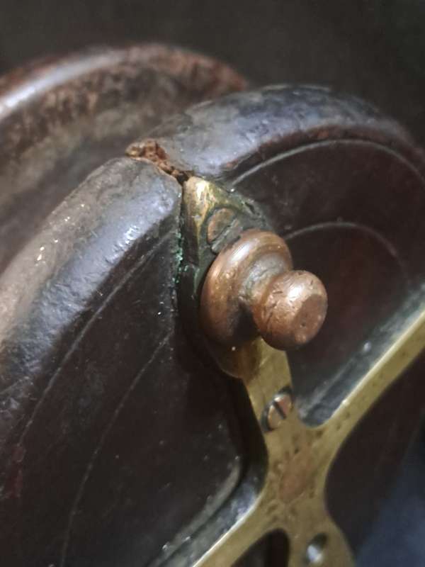 Sadler brass and wooden fishing reel (packed on wood)