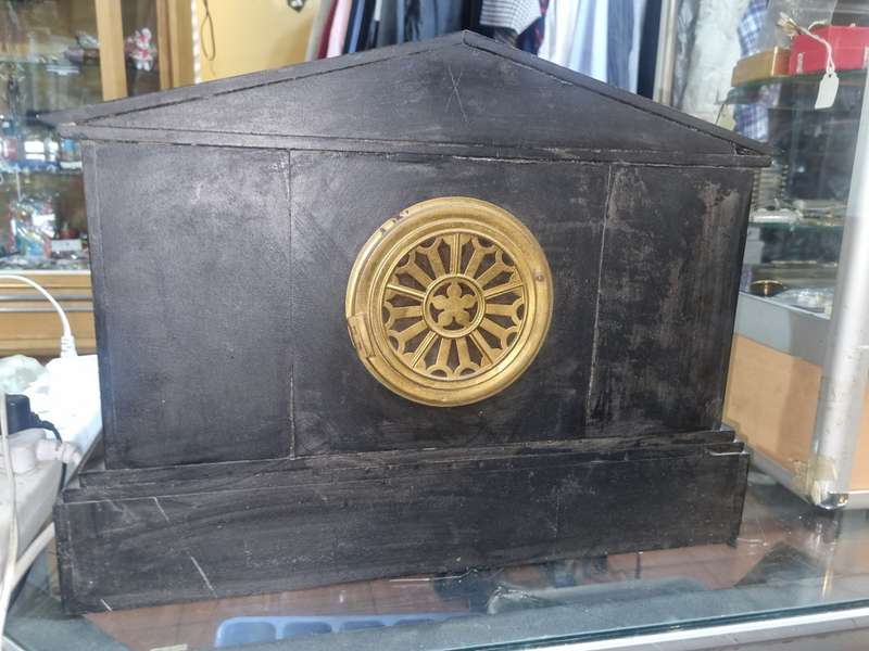 Marble mantle clock works just the chiming system not working  and some of those poles are loose