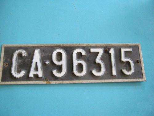 Plastic type number plate with metal backing condition per pic