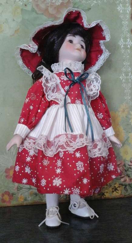 VINTAGE PORCELAIN DOLL