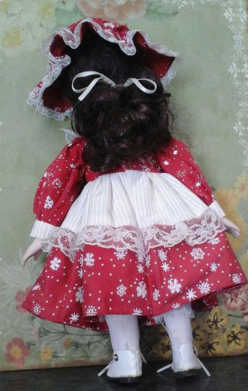 VINTAGE PORCELAIN DOLL