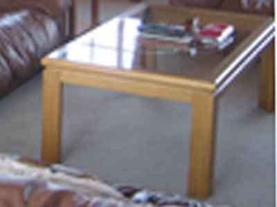Solid oak coffee table and two side tables.