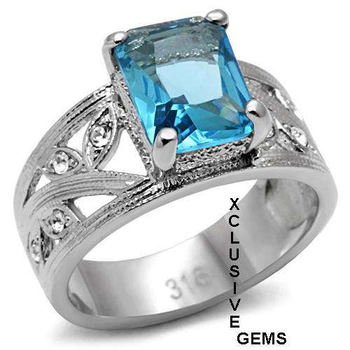 **FREE EARRINGS** STUNNING STAINLESS STEEL SIMULATED BLUE TOPAZ RING